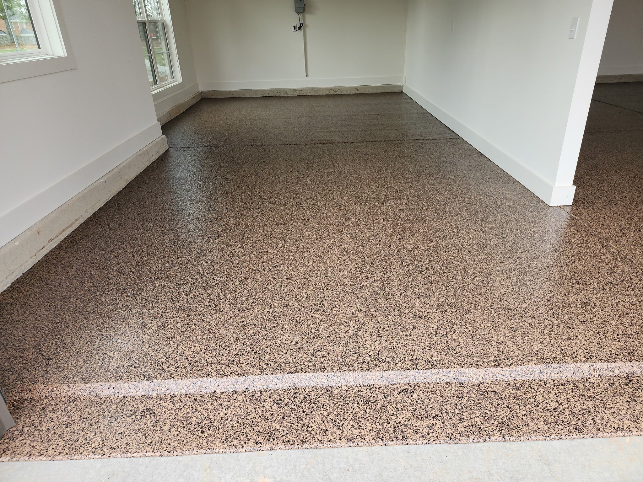 Floor Coating Services in Madison showing decorative coated flooring